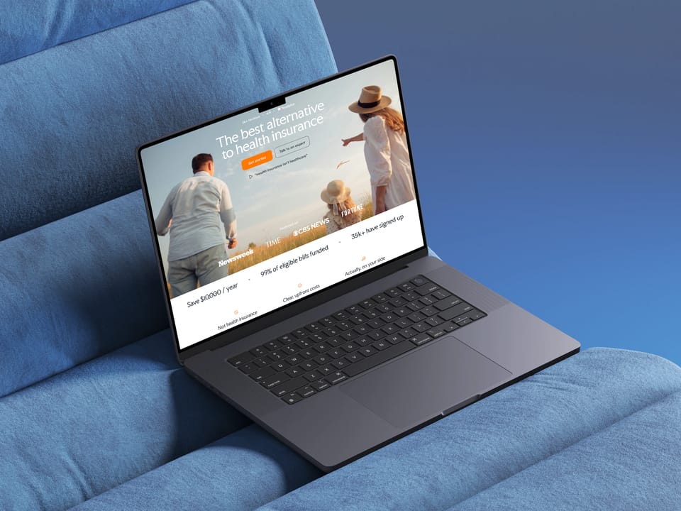 The reimagined CrowdHealth home page on a laptop